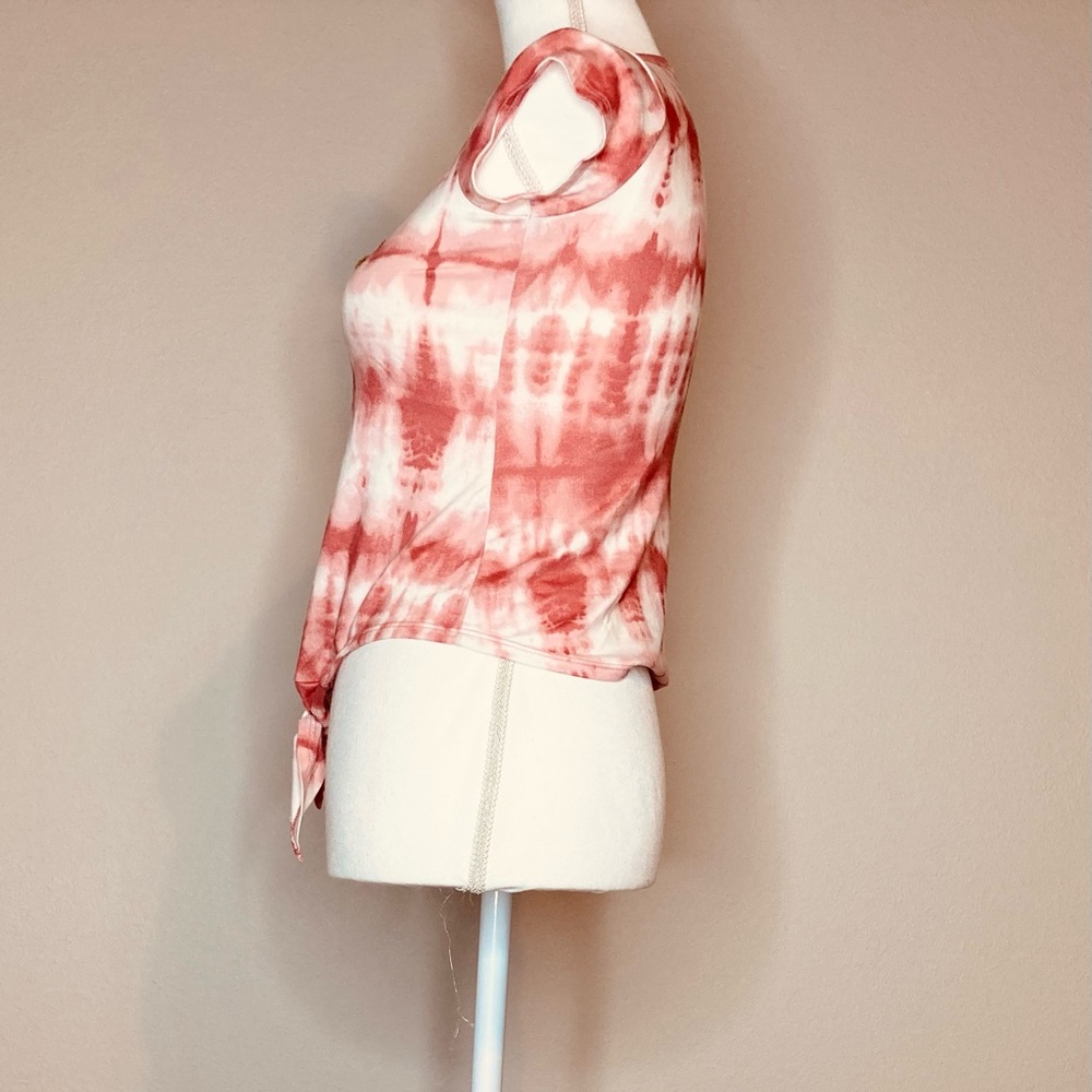 Pink and white tie die. Love on the front with flip sequins pink to gold.